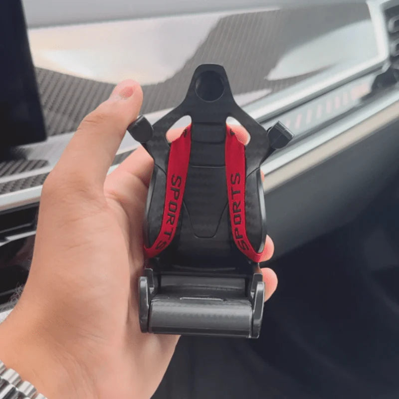 Carbon Schalensitz Halterung mit roten Renngurten